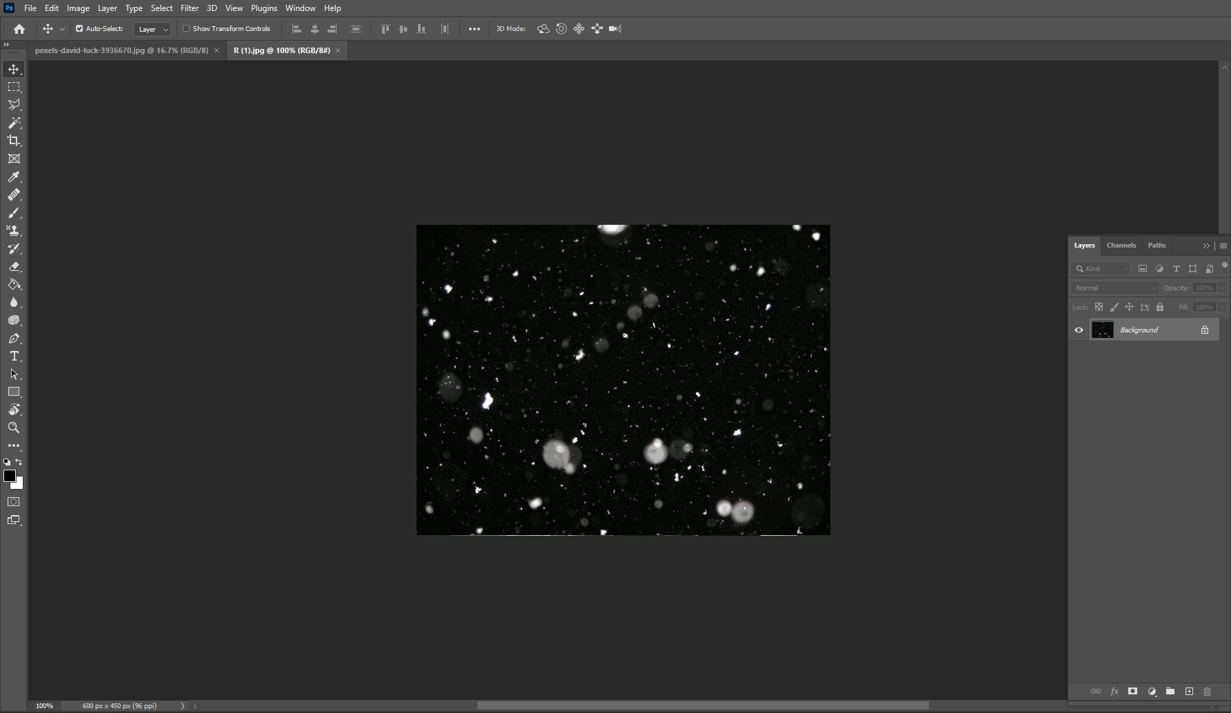 A screenshot of a website design software with a dark background and a central image of a galaxy