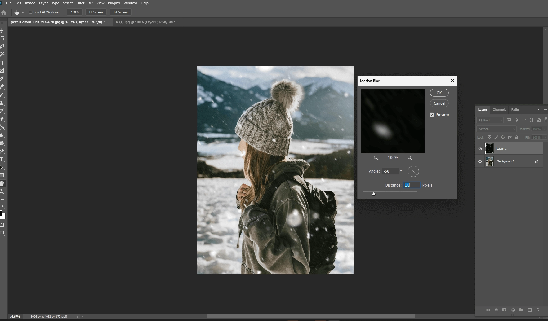Photoshop Motion Blur dialog with angle and distance settings beside the snowy photo