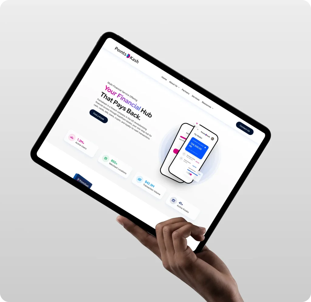 services A hand holding a tablet with a website on the screen