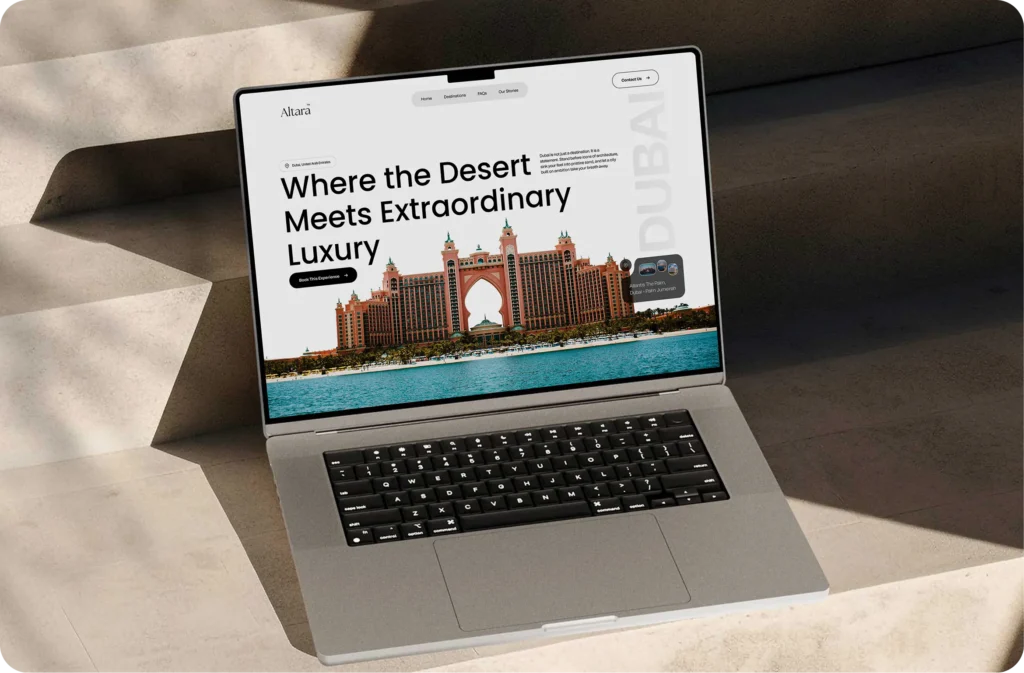 A laptop screen displaying a website with a large building and a body of water in the background, with the words 'Where the