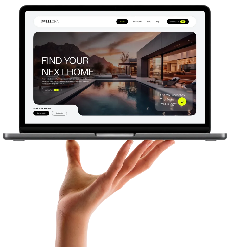 A real estate website on a laptop held in one hand